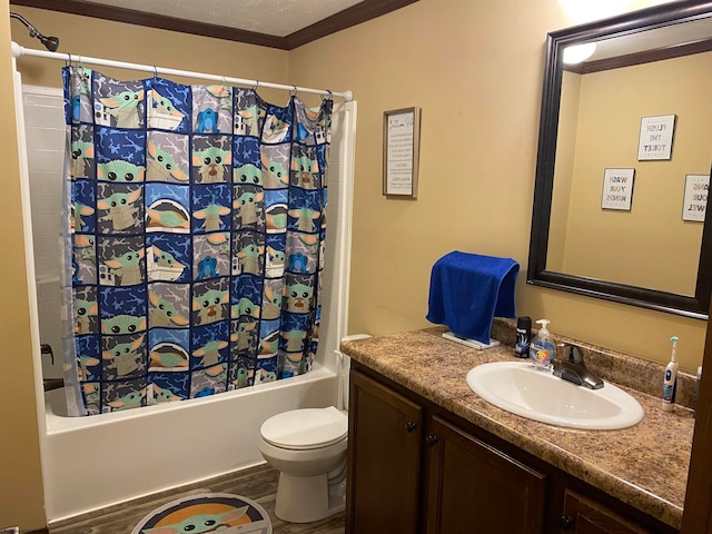 full bathroom with vanity, hardwood / wood-style flooring, toilet, shower / bath combo with shower curtain, and ornamental molding