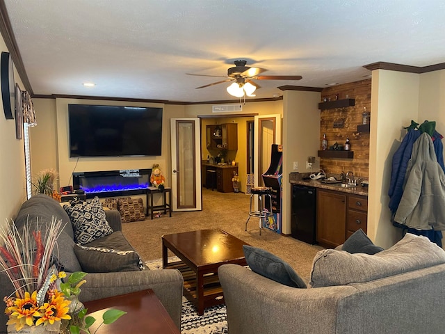 carpeted living room featuring a textured ceiling, ceiling fan, ornamental molding, and sink