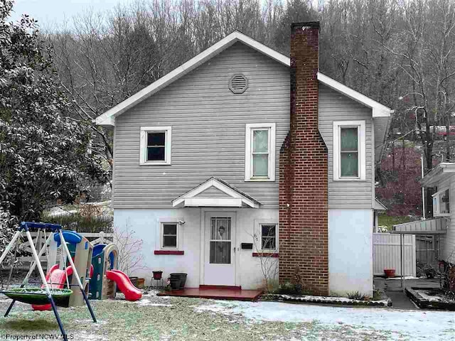 view of front facade with a playground