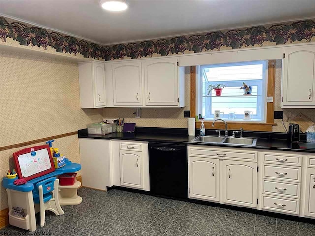 kitchen featuring white cabinets, dishwasher, and sink