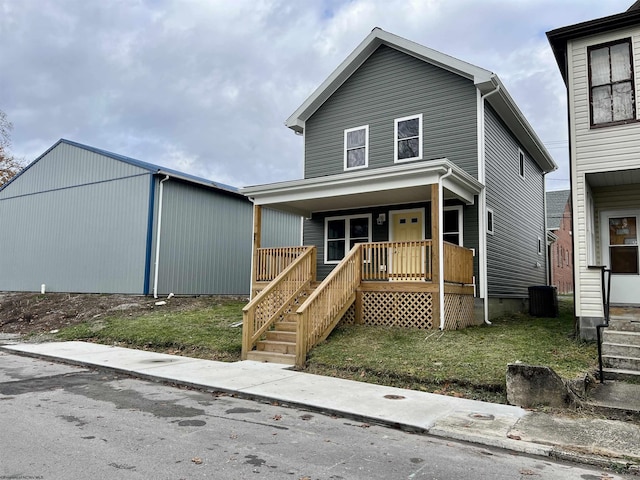 5 River St, Elkins, WV 26241 - view of front facade featuring covered porch, stairway, and a front yard