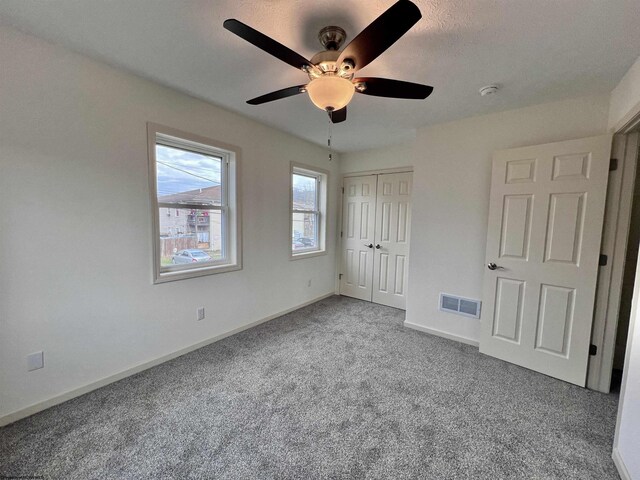 5 River St, Elkins, WV 26241 - unfurnished bedroom with carpet flooring, baseboards, a closet, and ceiling fan