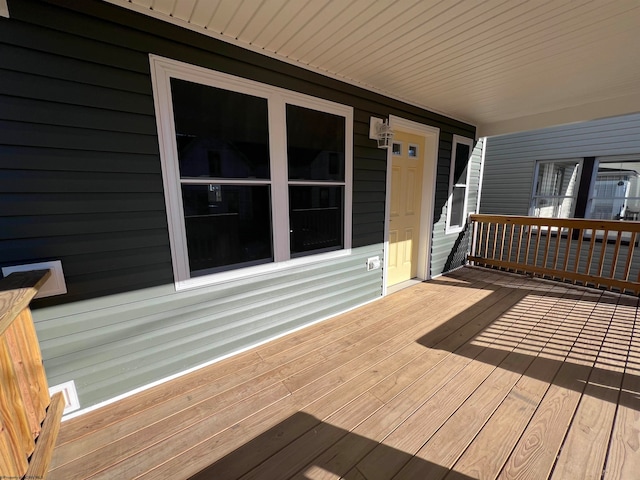 wooden terrace with covered porch