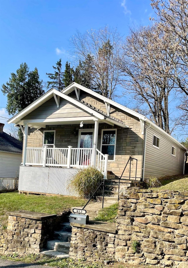 view of front of home featuring covered porch