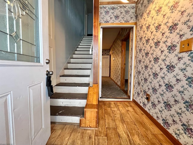 stairway with wood-type flooring