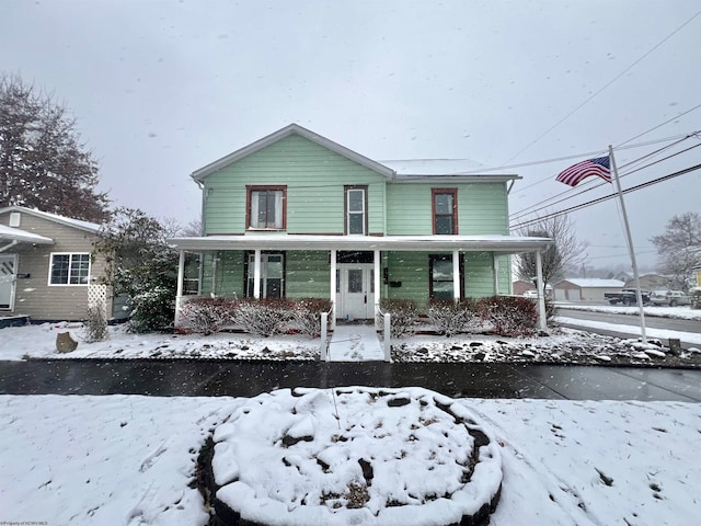 view of property with covered porch