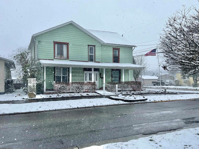 front facade featuring covered porch