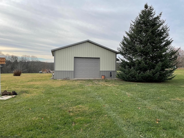 garage featuring a yard