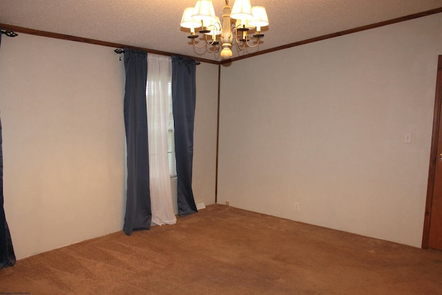 carpeted empty room featuring crown molding, a textured ceiling, and an inviting chandelier