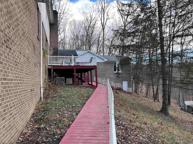 view of yard with a deck