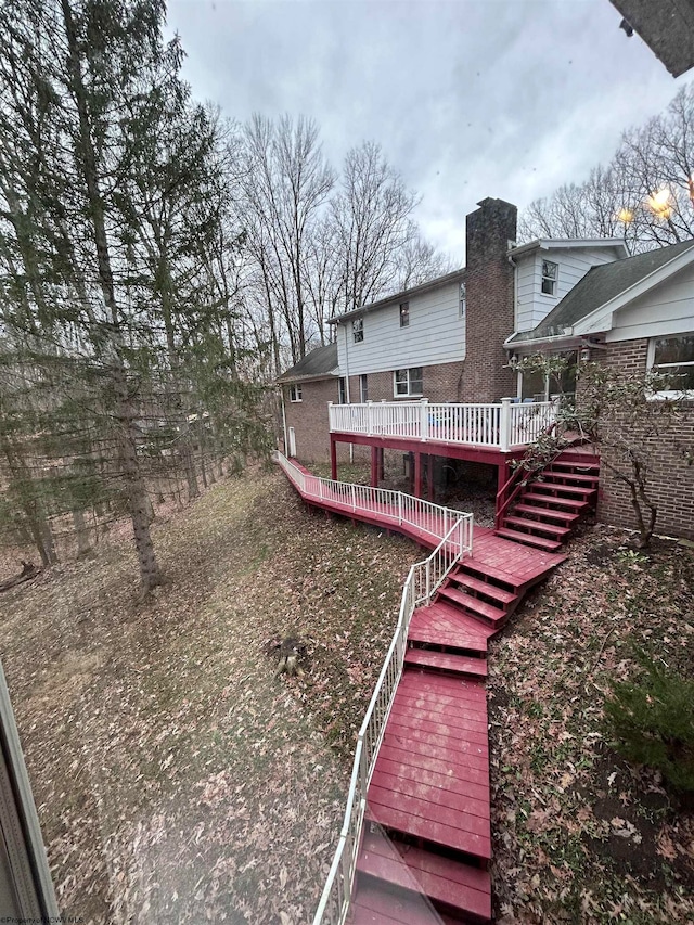 view of yard featuring a wooden deck