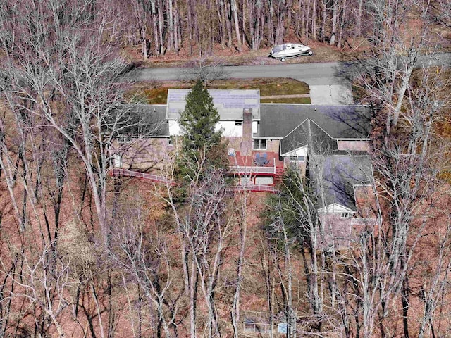 drone / aerial view with a view of trees