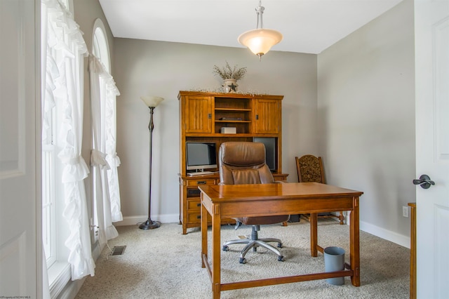 view of carpeted office space