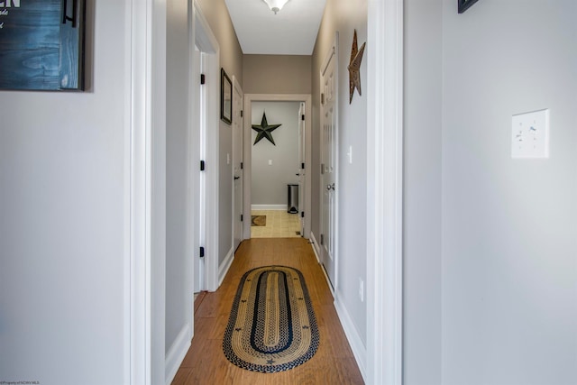 hallway featuring hardwood / wood-style floors