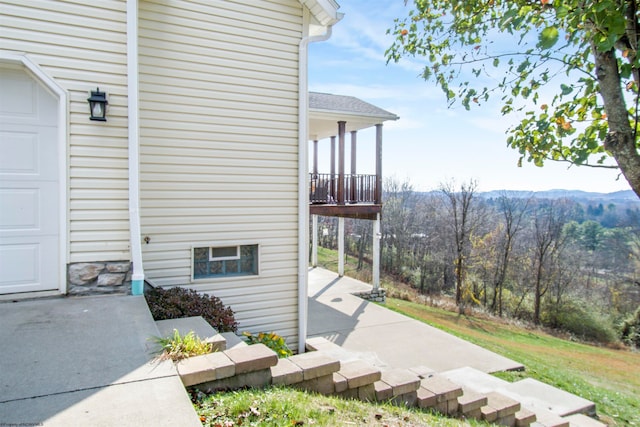 view of home's exterior featuring a balcony