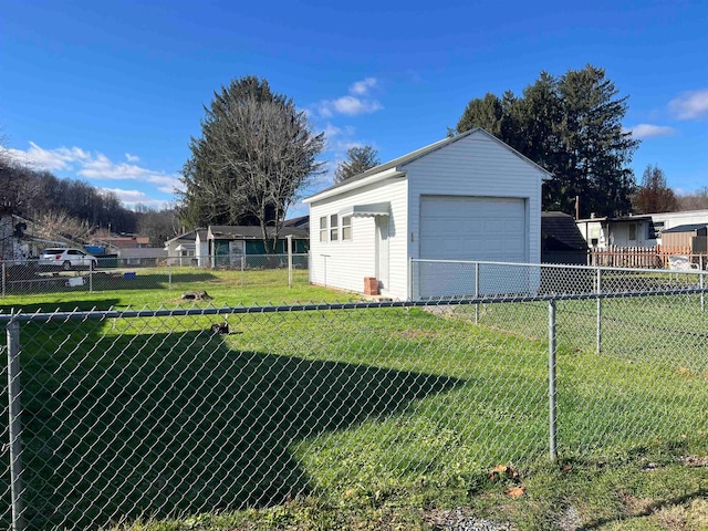 garage with a lawn