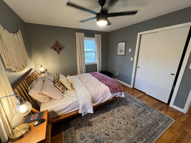 bedroom featuring a closet, ceiling fan, and hardwood / wood-style floors