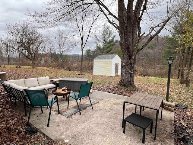 view of patio featuring a storage unit and an outdoor hangout area