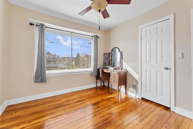 interior space featuring light hardwood / wood-style floors and ceiling fan