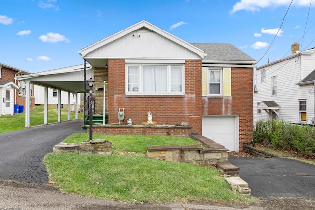 view of front of house with a garage and a front yard