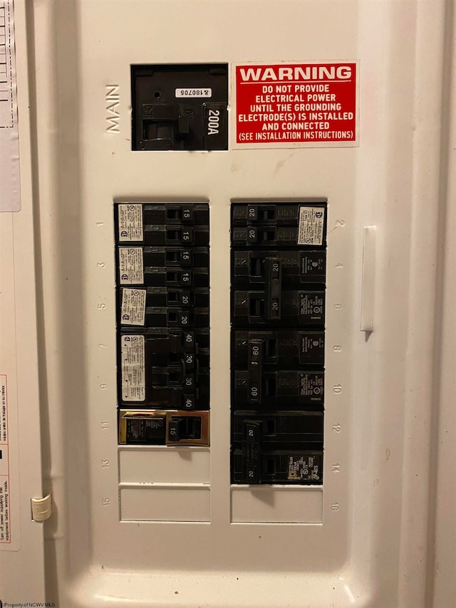 utility room featuring electric panel