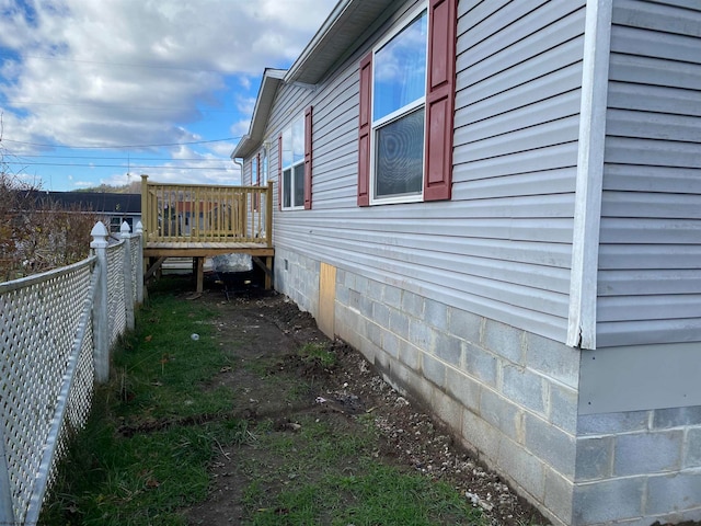 view of home's exterior with a deck