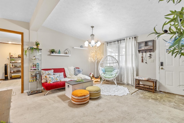 sitting room featuring light carpet, a chandelier, and a textured ceiling