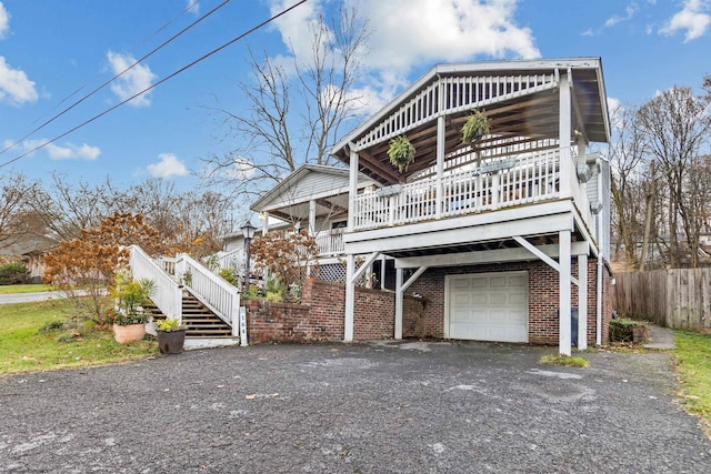 view of front of property with a garage