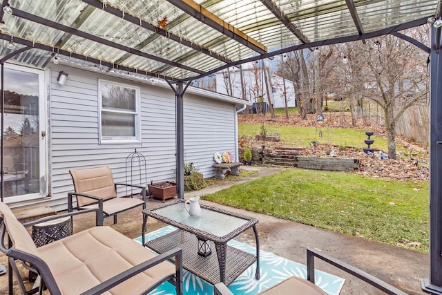 view of patio featuring an outdoor hangout area and a pergola