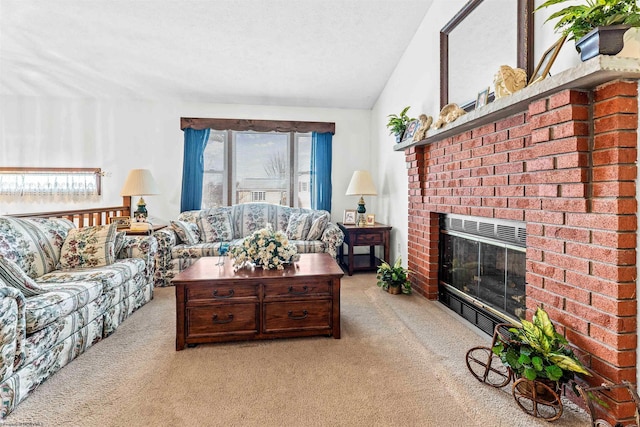 living room with vaulted ceiling, light colored carpet, a textured ceiling, and a brick fireplace