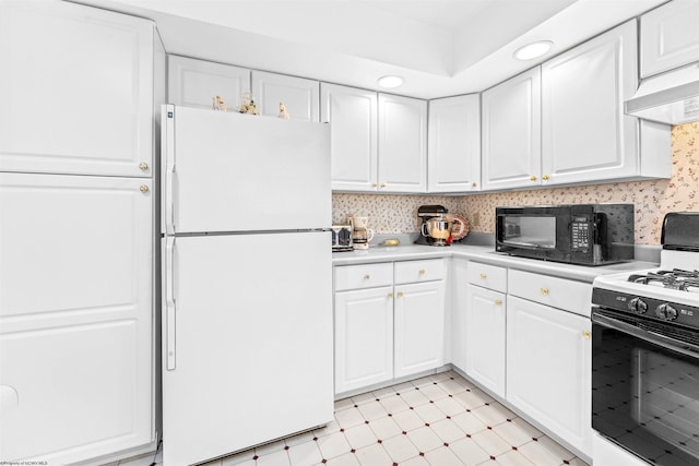 kitchen featuring premium range hood, white cabinetry, and black appliances