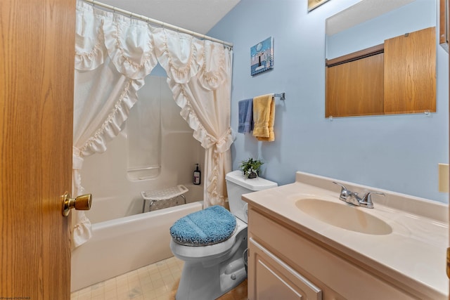 full bathroom with vanity, shower / bath combination with curtain, and toilet