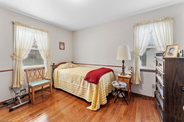 bedroom featuring hardwood / wood-style flooring