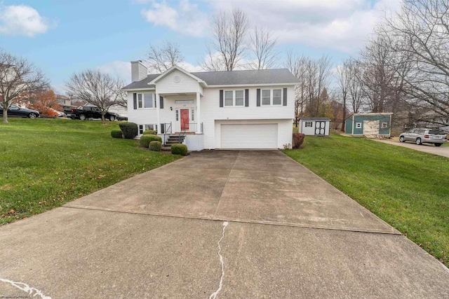 bi-level home with a front lawn, a garage, and a storage unit