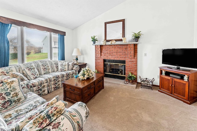 living room with a fireplace, light colored carpet, and vaulted ceiling