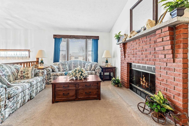 carpeted living room with a textured ceiling, a fireplace, and vaulted ceiling