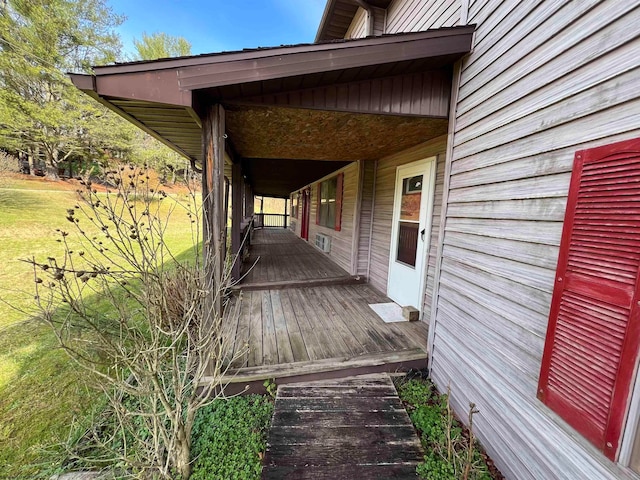 wooden deck featuring covered porch