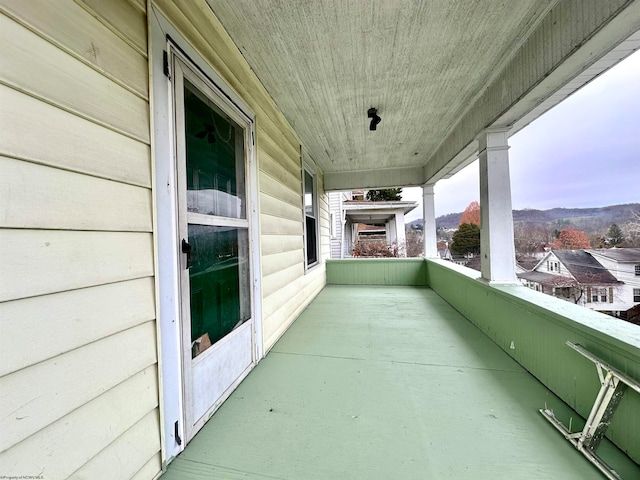 balcony featuring a mountain view