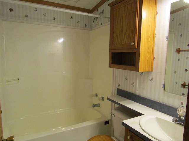 full bathroom featuring shower / tub combination, vanity, and toilet