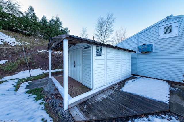2302 Red Rock Rd, Rowlesburg, WV 26425 - snow covered structure featuring a storage unit