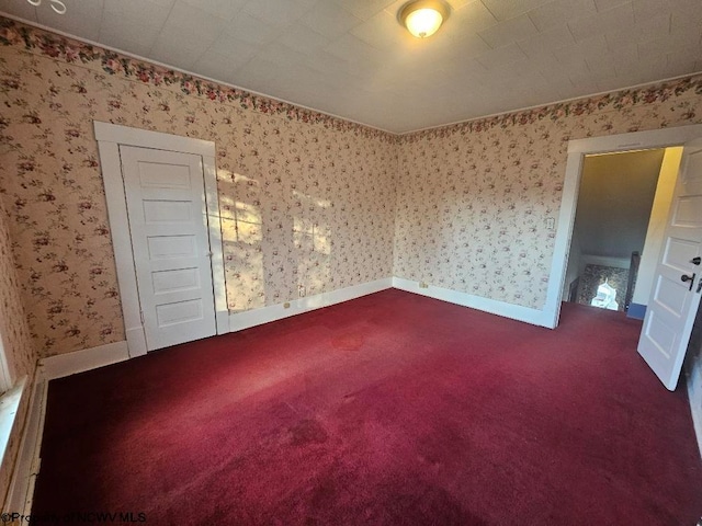 unfurnished bedroom featuring carpet flooring