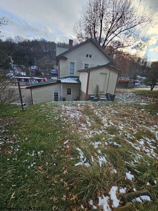 view of snow covered property