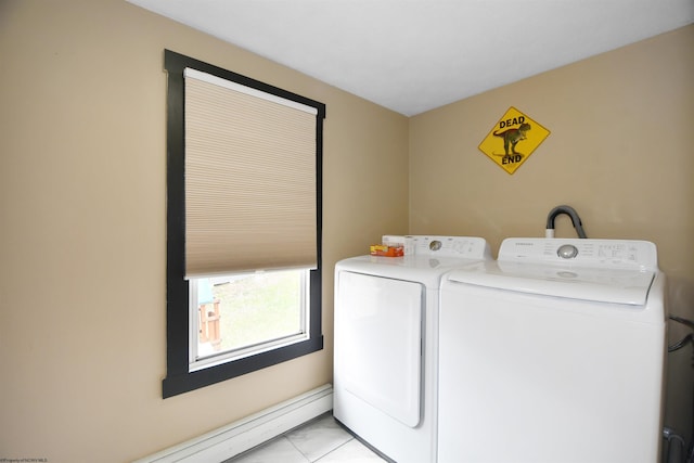 laundry room featuring separate washer and dryer, light tile patterned floors, and a baseboard radiator