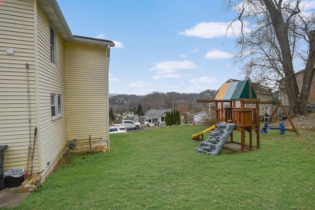 view of jungle gym with a yard