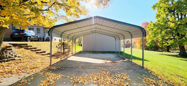 view of car parking featuring a carport and a yard