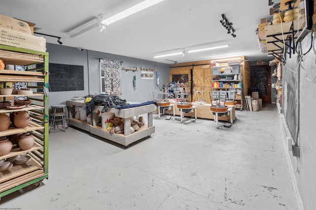 interior space featuring a barn door