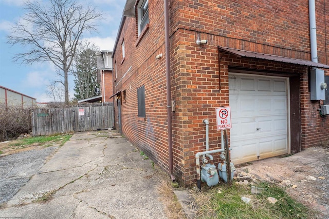 view of side of property with a garage