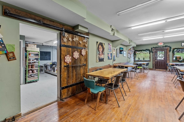 dining area with light wood-type flooring