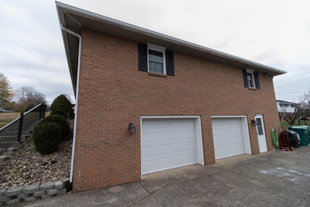 view of property exterior featuring a garage