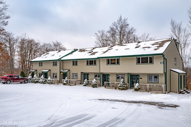 view of snow covered house